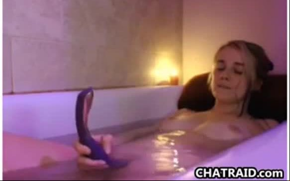 Teen masturbates in the bath tub